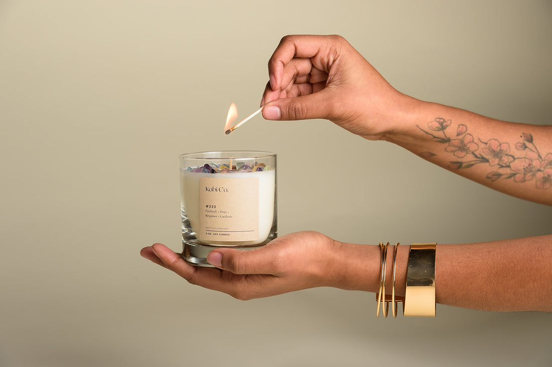 Lit #222 soy candle with fluorite crystals