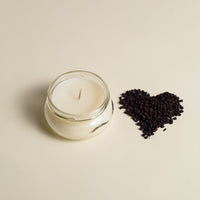3 oz After the storm soy candle beside elderberry