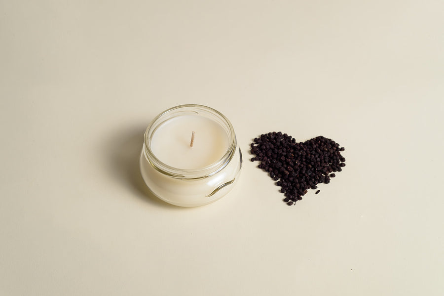 3 oz After the storm soy candle beside elderberry